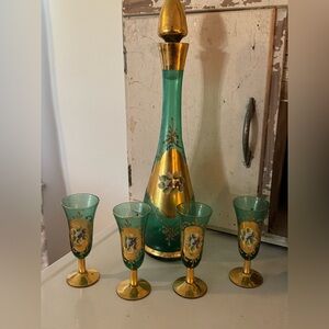 Murano glass decanter set with hand-painted floral designs and 24k gold accents